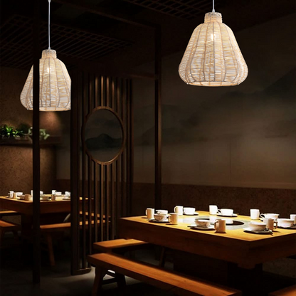 Statement woven rattan pendant light adding rustic elegance to restaurant dining spaces