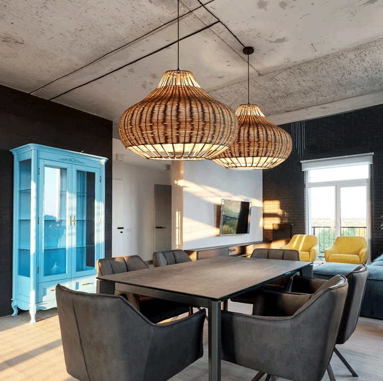 Teardrop-shaped rattan hanging ceiling lamp above a dining table in a modern apartment