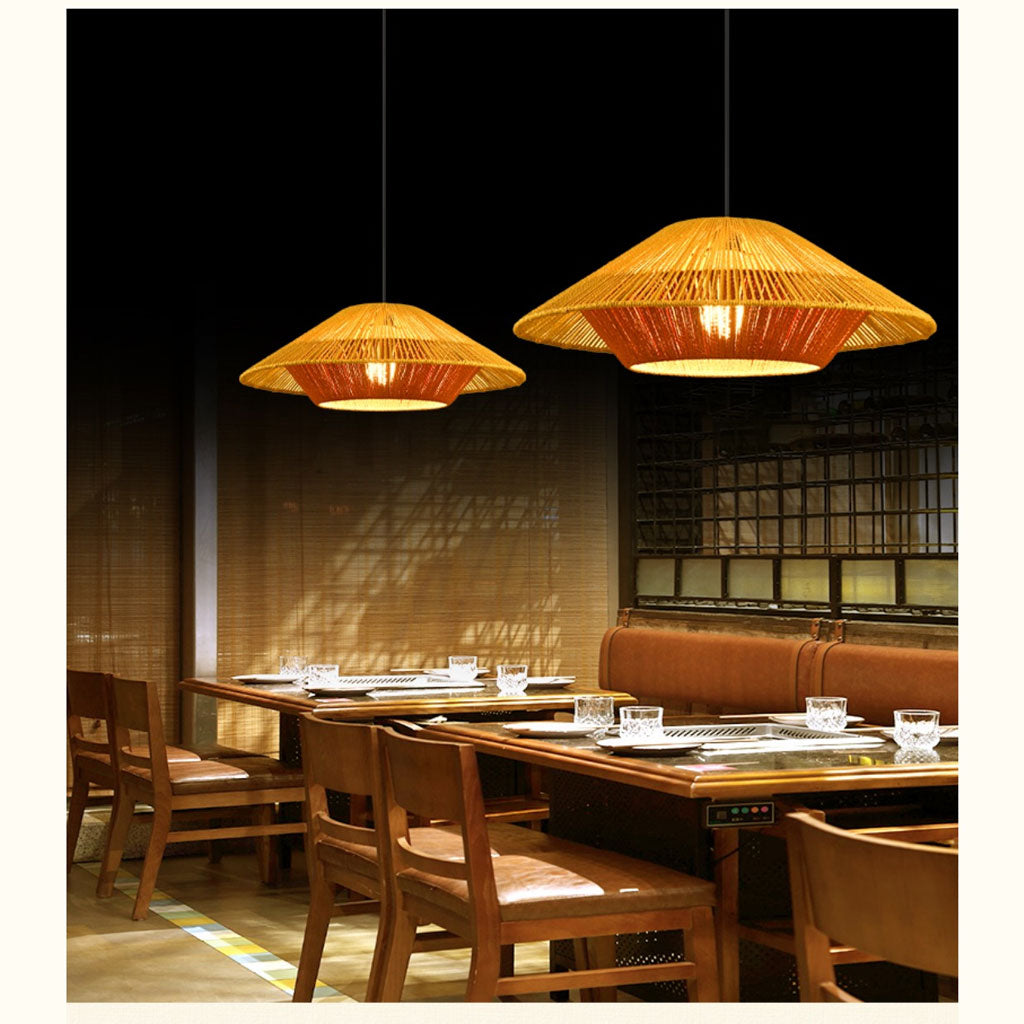 Architectural earthy basket light fixture with a terracotta-colored top cone and a cream-colored lower diffuser tier.