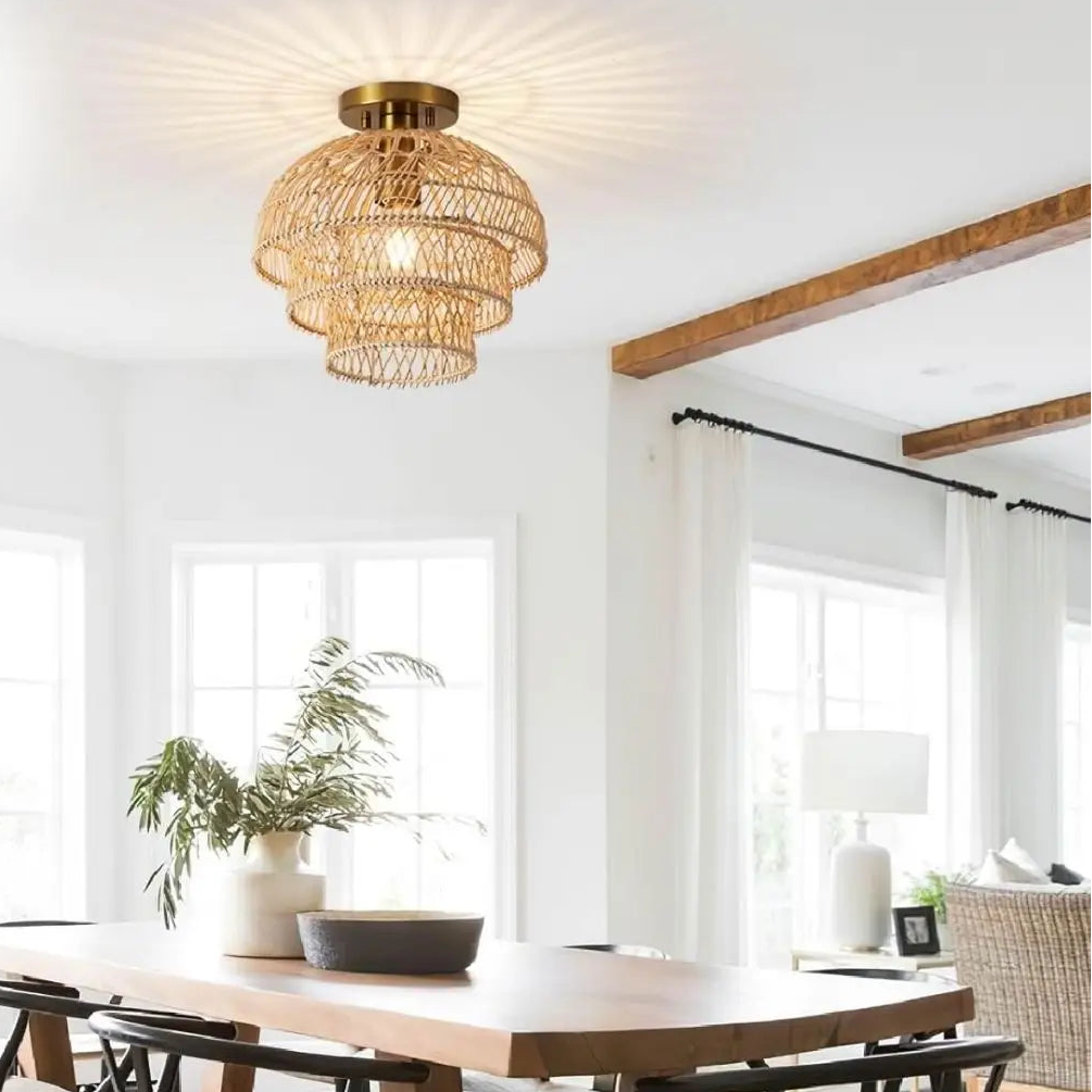 Tiered rattan ceiling light perfectly placed over a kitchen island to create a natural, bright dining mood.