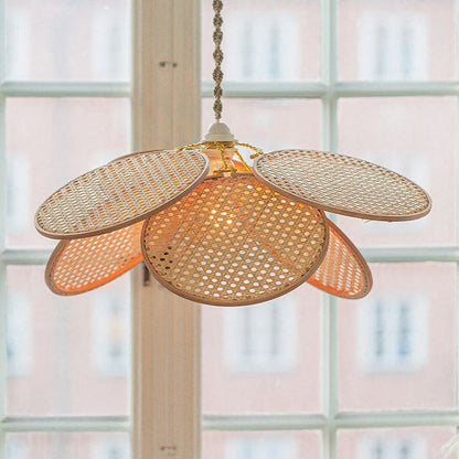 Unique flower-shaped rattan chandelier featuring decorative cane mesh detailing for a high-end, artisan finish.