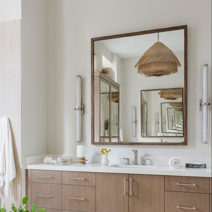 Wabi-Sabi straw thatch chandelier with organic layered textures suspended against a white background
