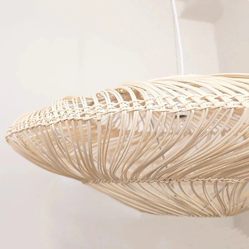 Eco-friendly Wabi-Sabi hanging lamp woven from natural bamboo, diffusing a soft warm glow.