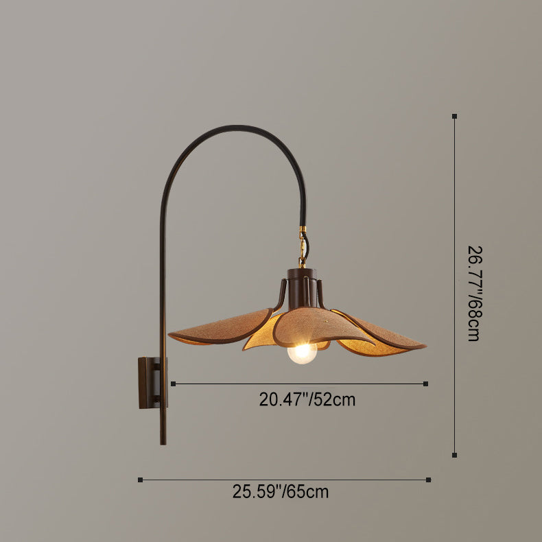 Sculptural wood and fabric wall lamp for unique artistic lighting in an art room