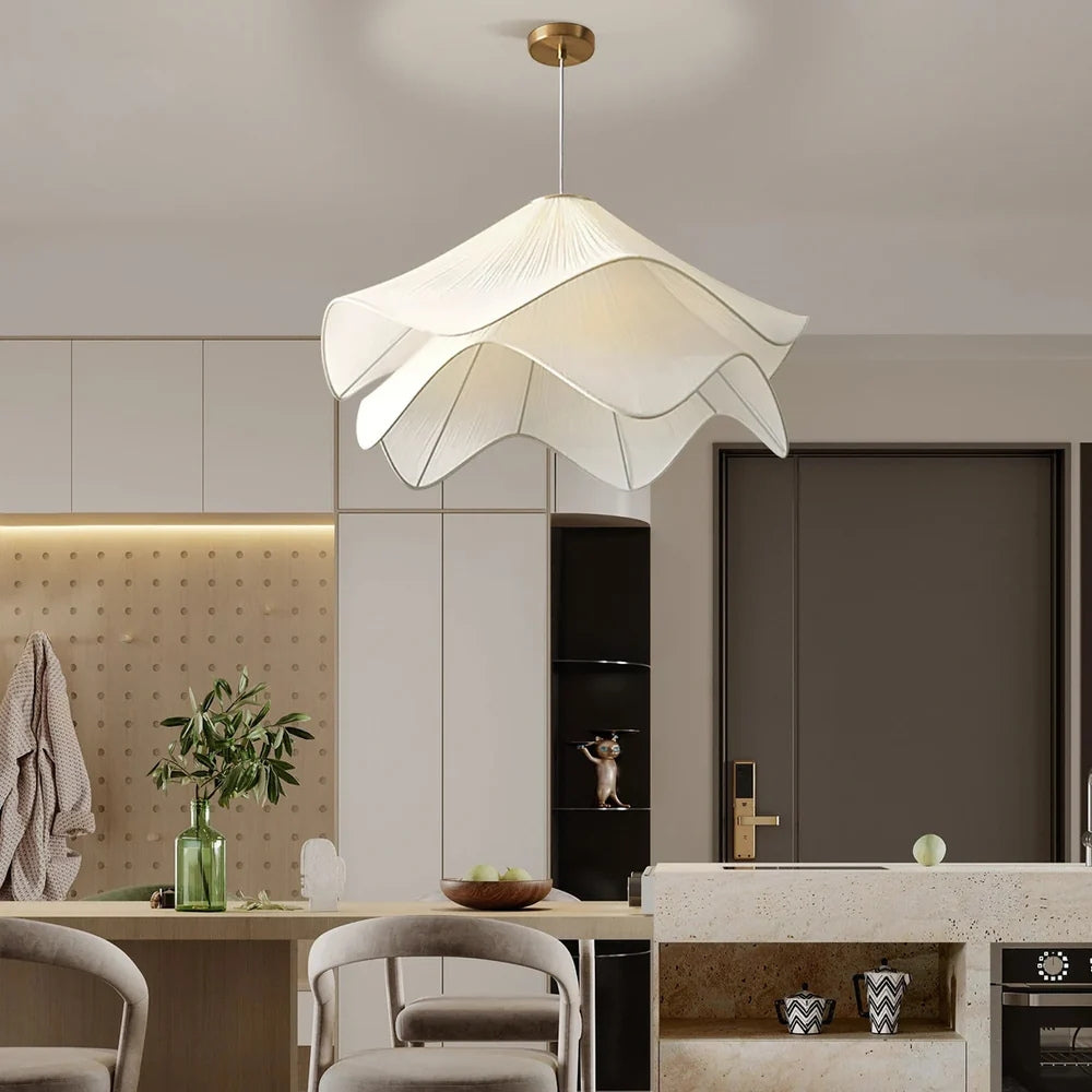 Layered white fabric pendant light creating a Zen living room vibe