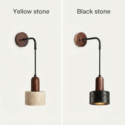 Side-by-side comparison of two wall sconces labeled 'Yellow stone' and 'Black stone', each with a round wood backplate, black metal arm, dark brown cylindrical shade, and a stone shade in a light beige color.