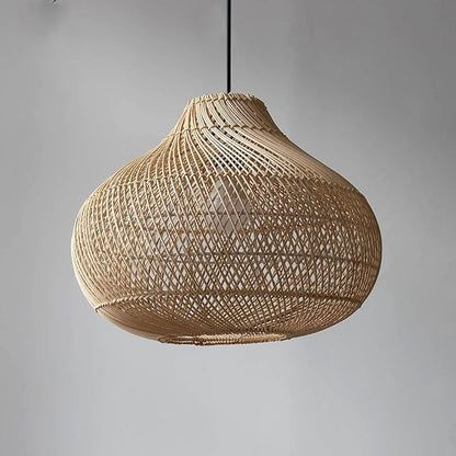 Boho chic hanging lights made of natural fibers illuminating a patio space.