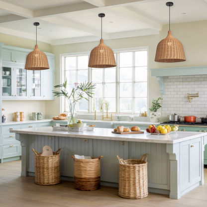 Beautiful rattan light fixture hanging above a modern boho-style kitchen island
