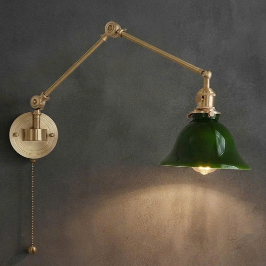 Brass and ceramic material lamp featuring an articulated swing arm for luxurious, warm, and inviting architectural lighting.