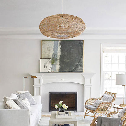 Decorative rattan pendant lights installed above a dining room setting.