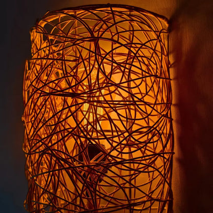 Entryway light natural rattan fixture creating a warm, organic, and welcoming first impression for guests.