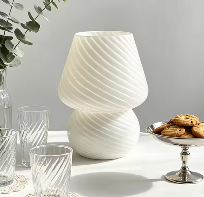 Minimalist frosted glass mushroom desk lamp featuring smooth translucent styling for upscale lounge and living areas