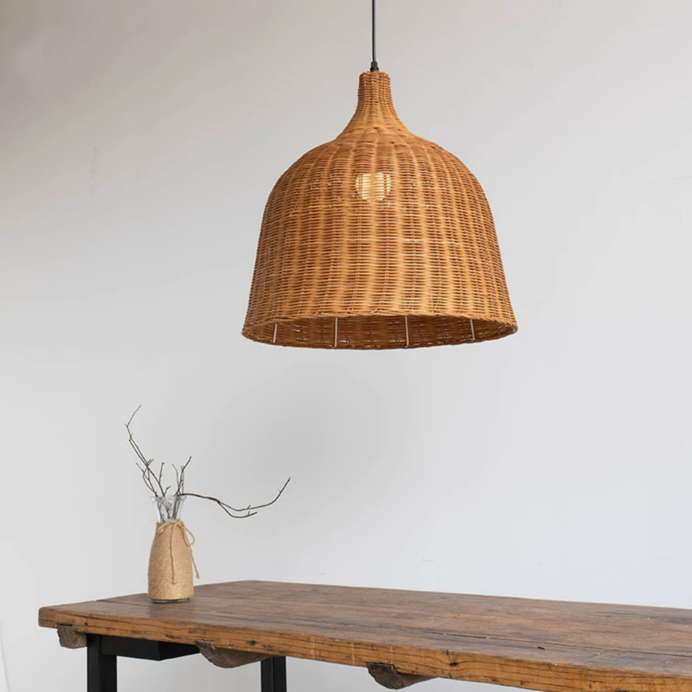 Modern rattan hanging pendant light with an elegant, tapered woven design.