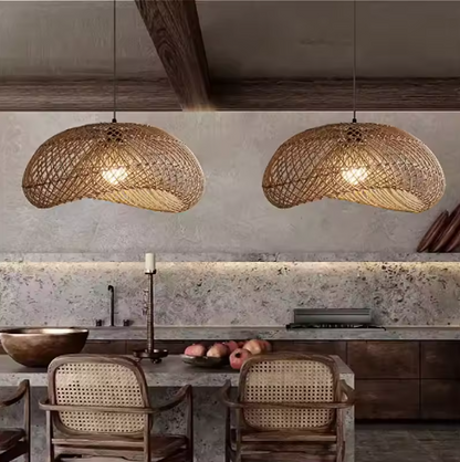 Close-up of a modern rattan pendant fixture showing the woven fiber details.