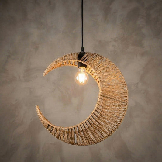 Handmade eco-friendly moon-shaped pendant light crafted from natural fibers for a sustainable living room.