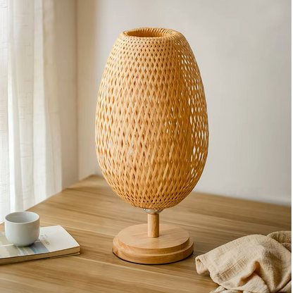 Organic Wabi-sabi woven rattan and wood table lamps providing sustainable lighting decor for home study spaces.