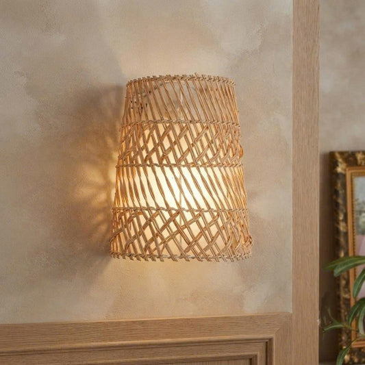 Handmade eco-friendly natural rattan wall sconce crafted from sustainable plant fibers for a healthy living room.