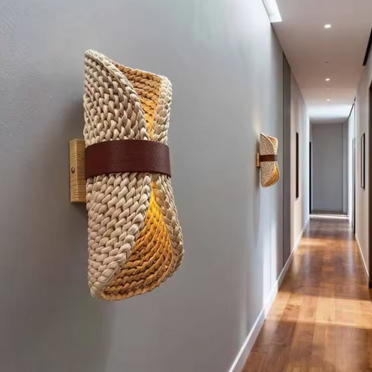 Sustainable handcrafted organic water hyacinth wall light offering eco-friendly charm for a welcoming entryway.