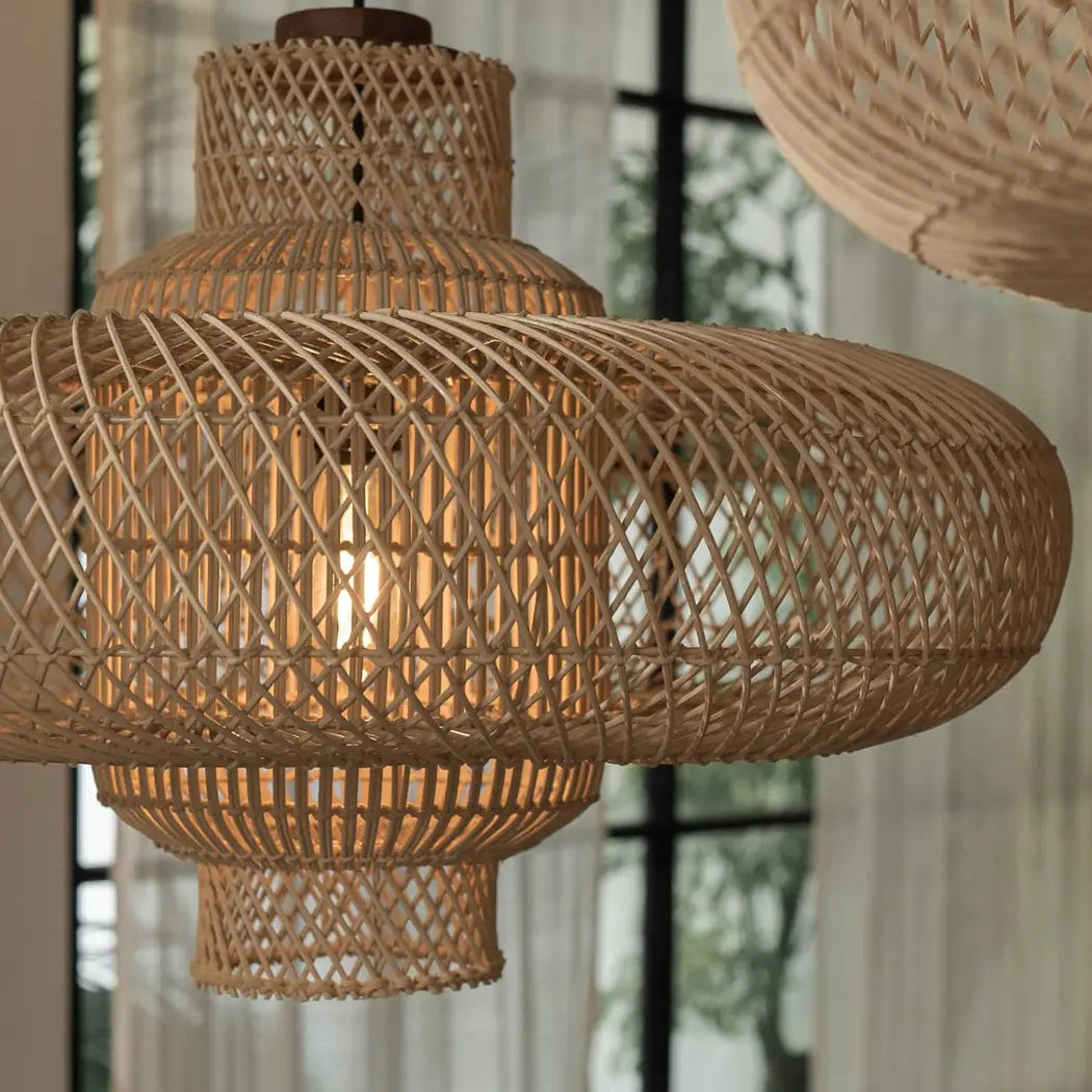 Minimalist Scandi-inspired natural fiber pendant lamp, handcrafted from eco-friendly rattan materials.