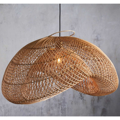 Detailed shot of a textured woven fiber lamp shade casting soft light