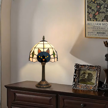 Vintage retro style stained glass lamp with a unique black cat motif, serving as a statement piece for hallway console tables.
