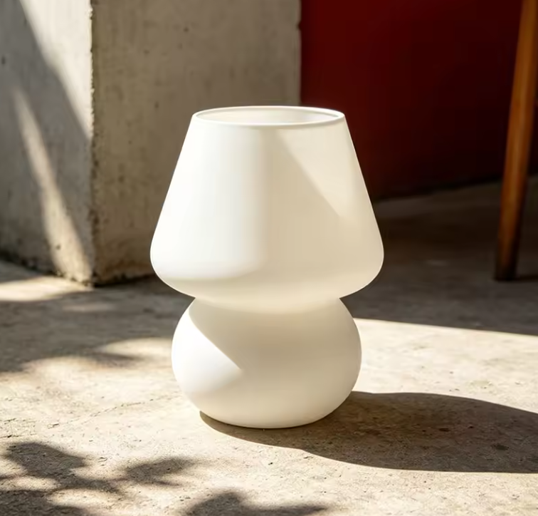 Classic white dotted glass accent lamp with a mushroom silhouette, perfect for adding vintage warmth to study desks.